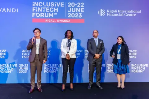 Michael Low speaking on stage